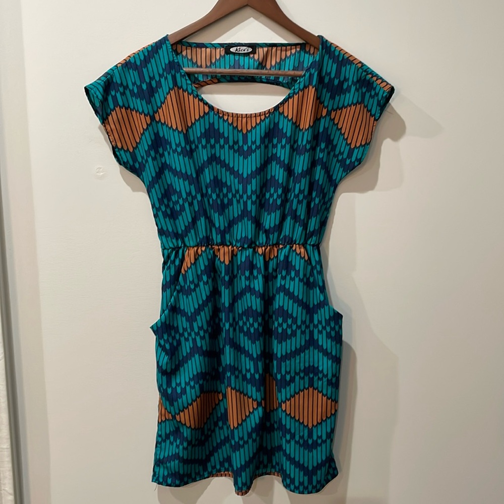 Kieu’s geometric silky dress